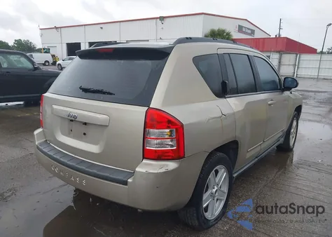 2010 Jeep Compass Sport from USA, damaged, VIN 1J4NT4FB8AD558082